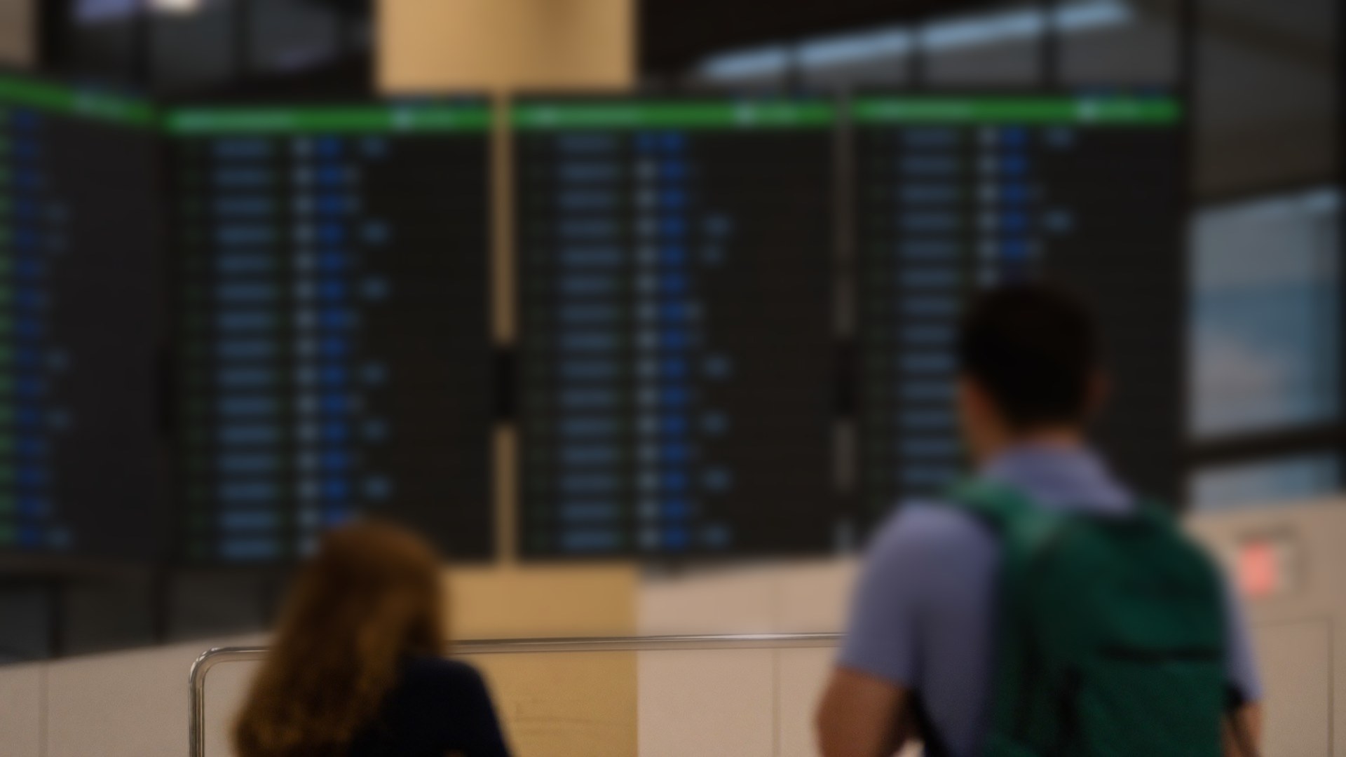 Flight information display screens in a terminal